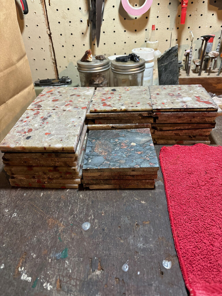 Making puddingstone tiles in the rock shop